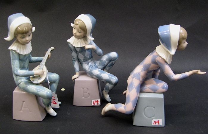 Appraisal: SET OF THREE LLADRO GLAZED PORCELAIN FIGURES Harlequin A G