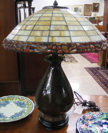 Appraisal: A TIFFANY STYLE TABLE LAMP the shade having a beaded