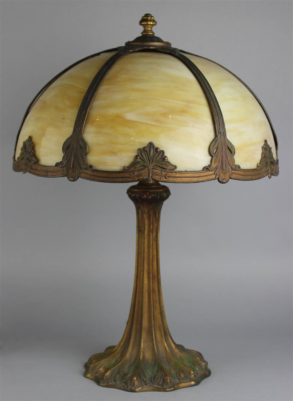 Appraisal: AMERICAN SLAG GLASS AND GILT METAL TABLE LAMP with six