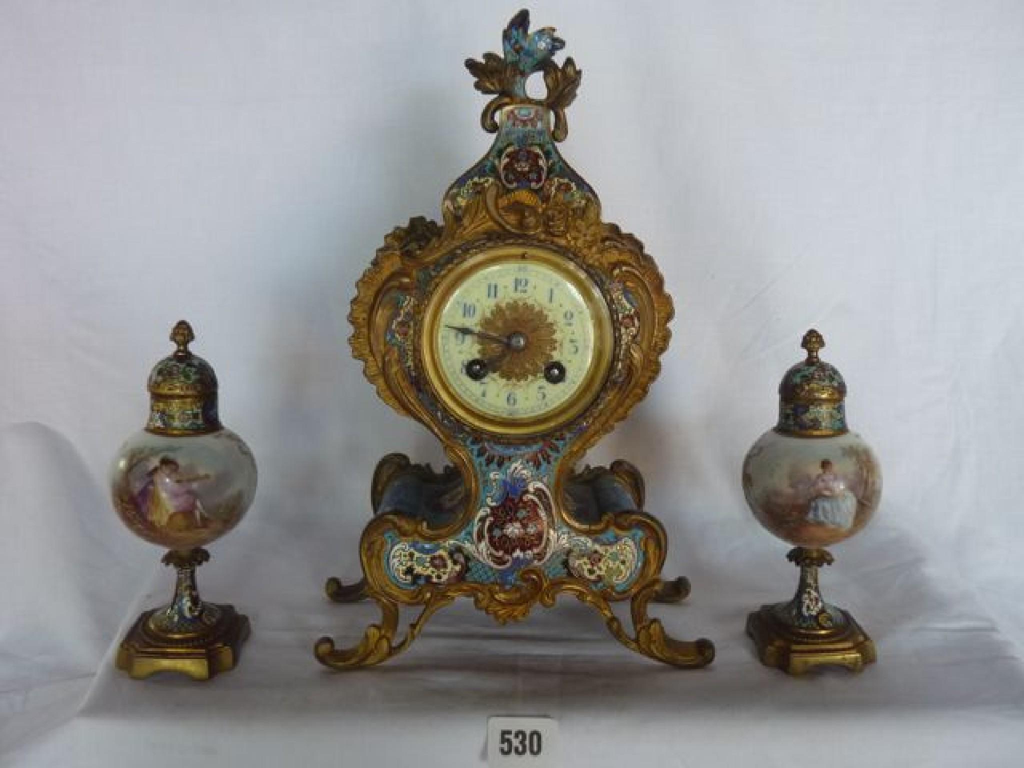 Appraisal: A good th century French gilt brass and enamel clock