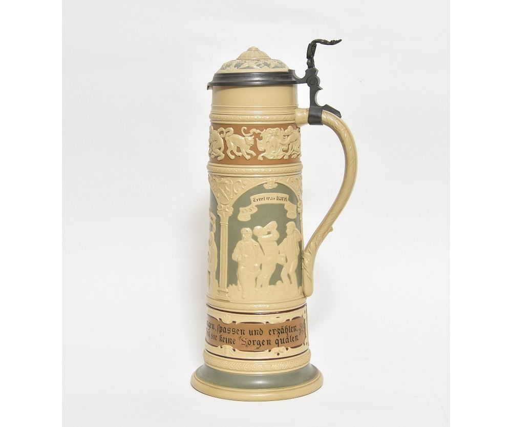 Appraisal: Mettlach Stein Mettlach stein decorated with raised card players litres