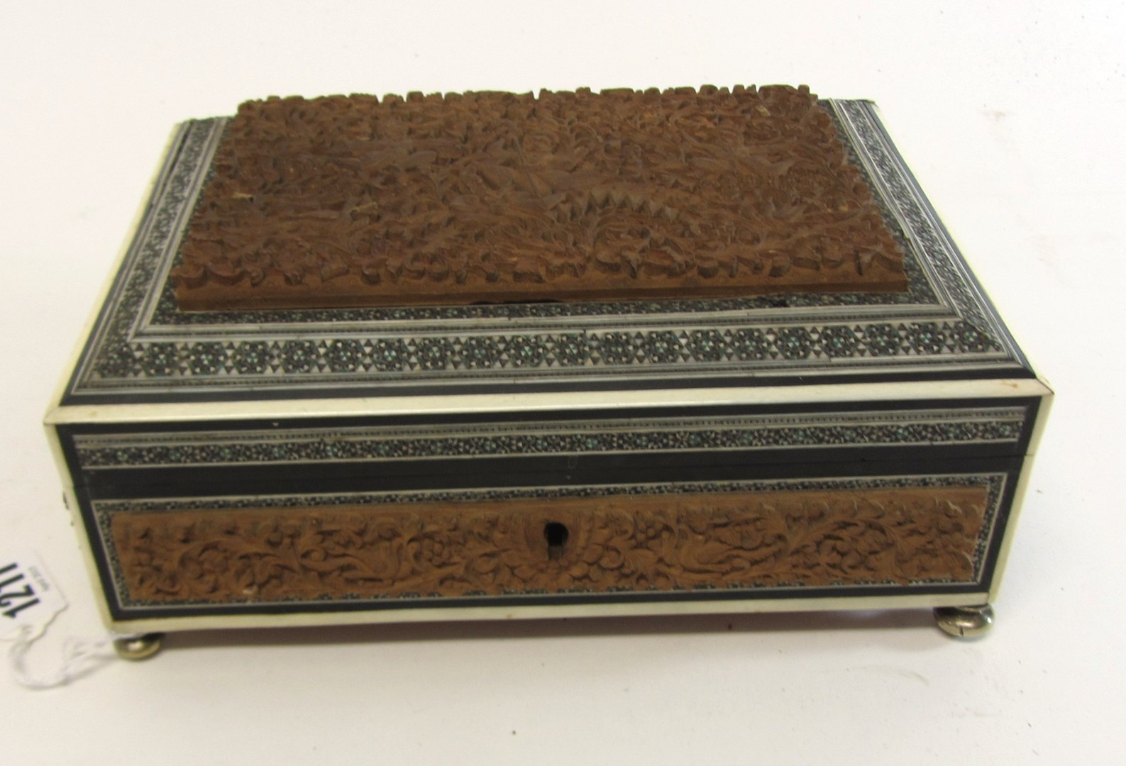 Appraisal: A th century Indian inlaid carved sandalwood rectangular box cm