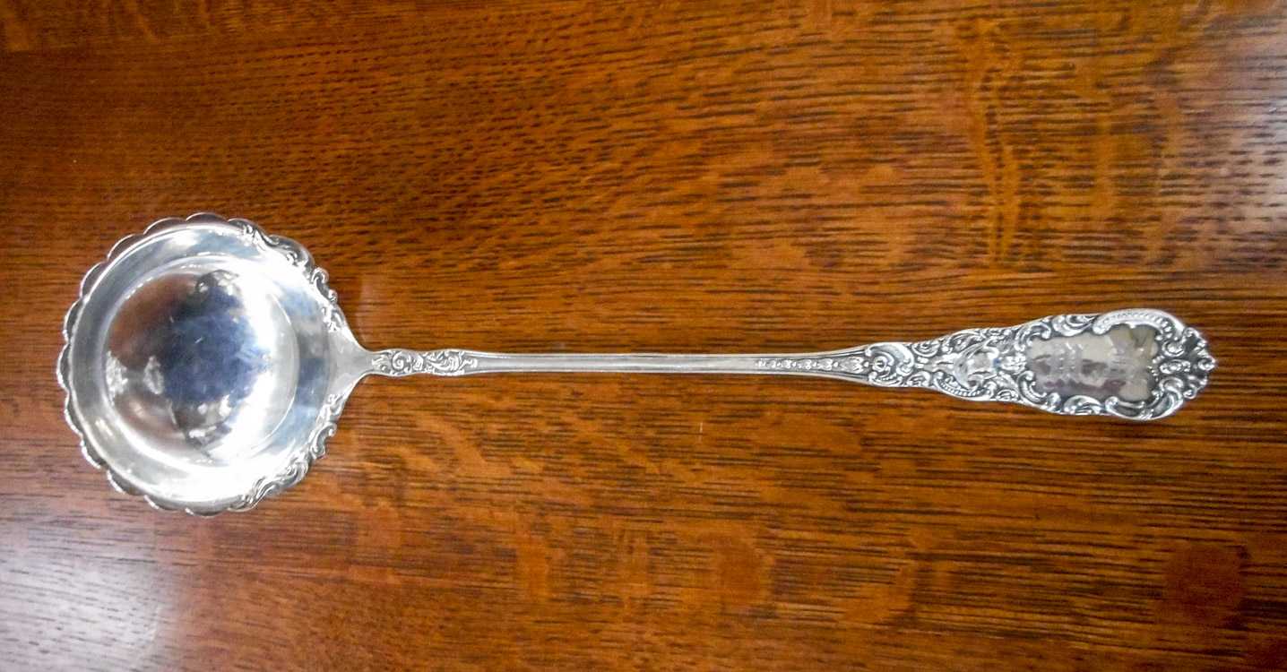 Appraisal: DOMINICK HAFF STERLING SILVER PUNCH LADLE Cupid pattern Length inches