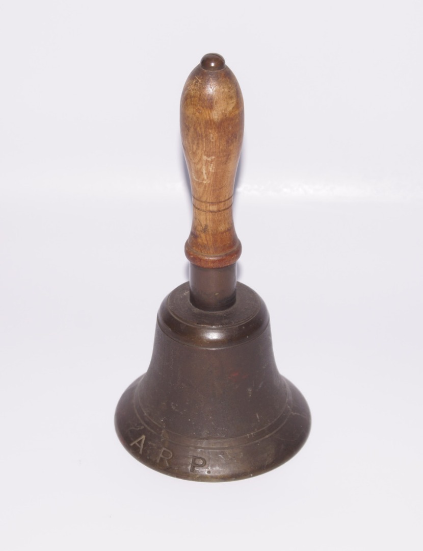 Appraisal: A cast bell metal with mahogany handle a ARP bell