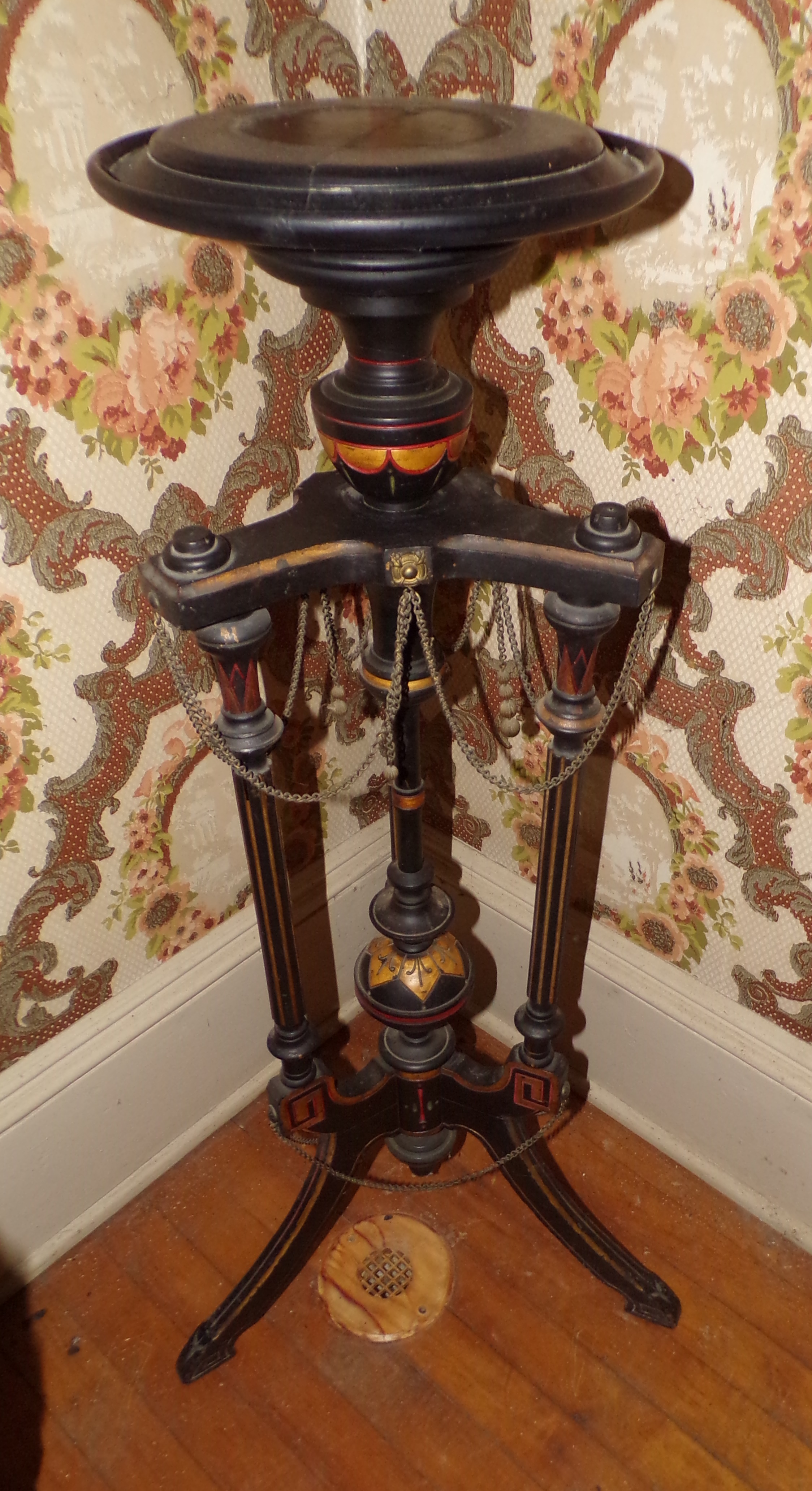 Appraisal: Victorian black lacquer candle stand with pencil carved gilt decoration