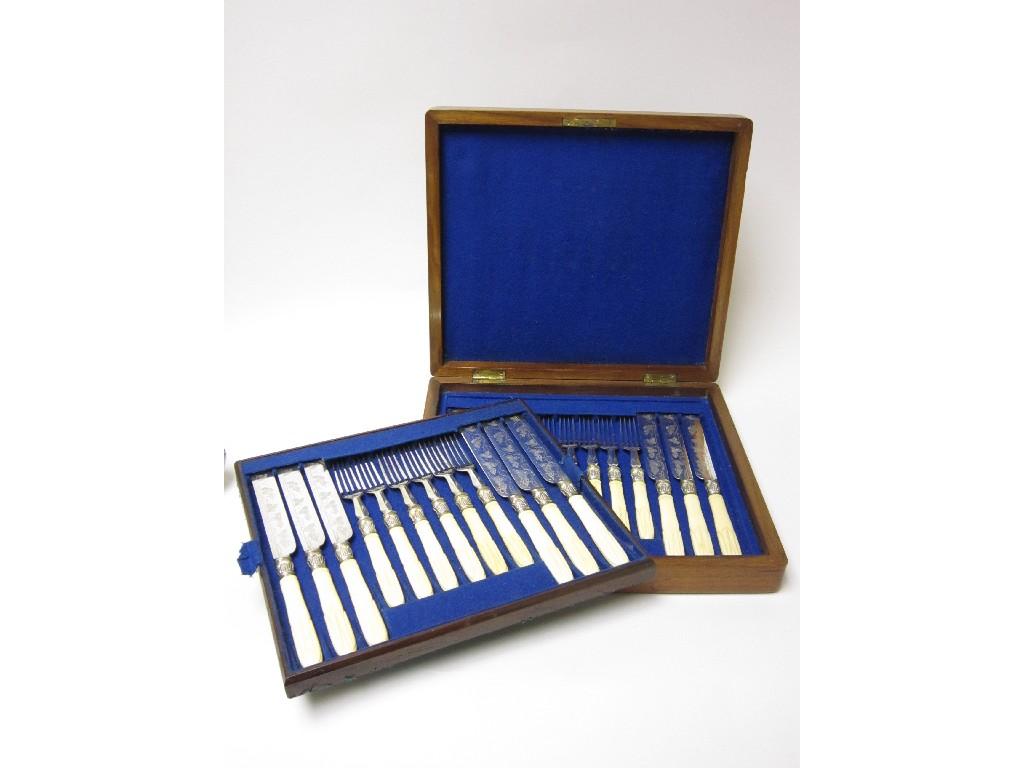 Appraisal: A set of twelve plated Tea Knives and Forks with