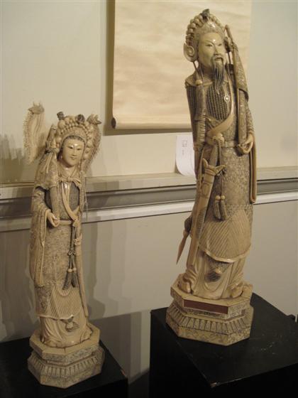 Appraisal: Impessive pair of Chinese solid and pieced ivory figuresHeavy and