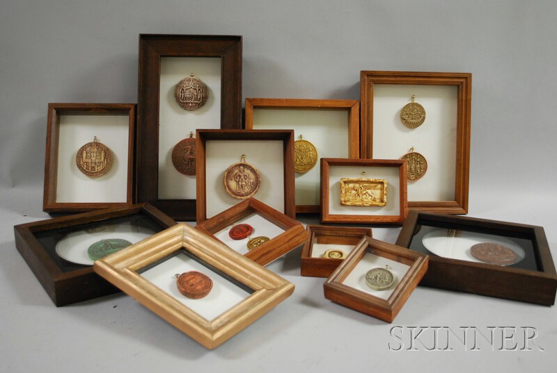 Appraisal: Twelve Frames Containing Fifteen Wax Seals Depicting Various Medieval Subjects