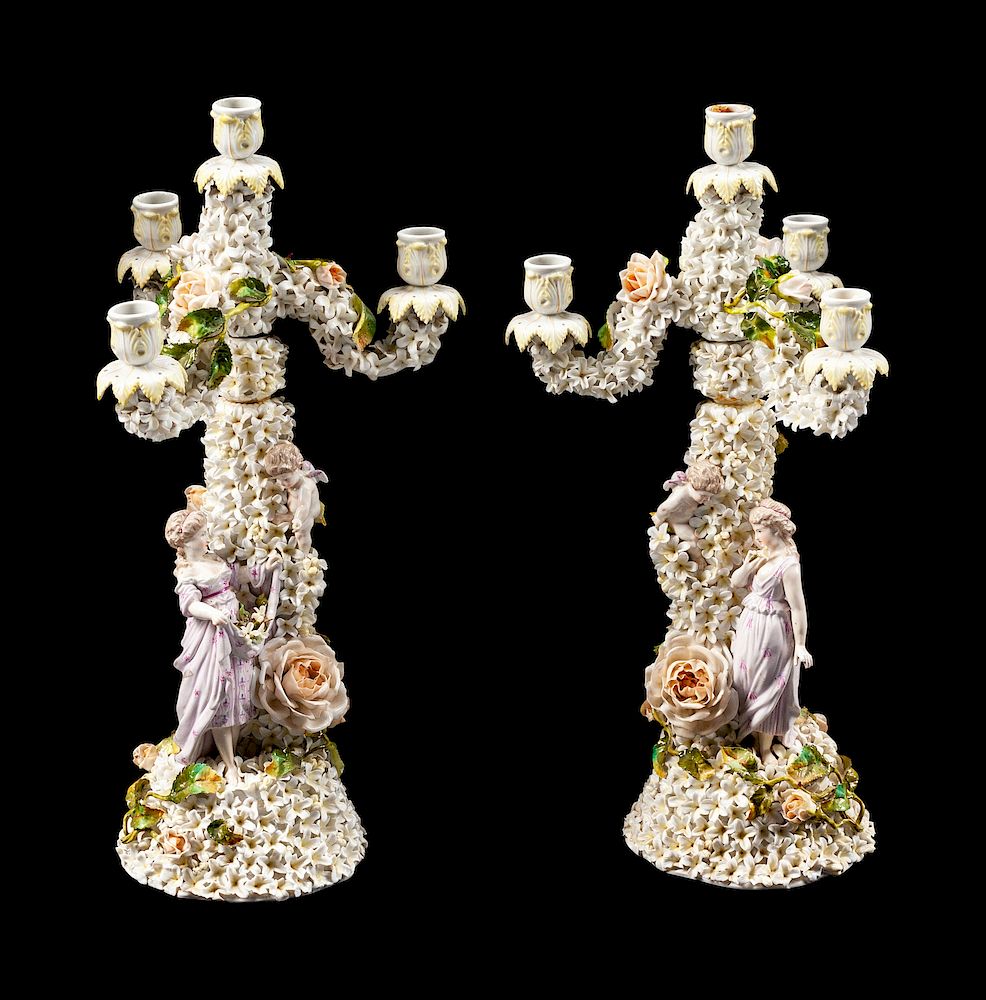 Appraisal: A Pair of German Porcelain Schneeballen Figural Four-Light Candelabra A