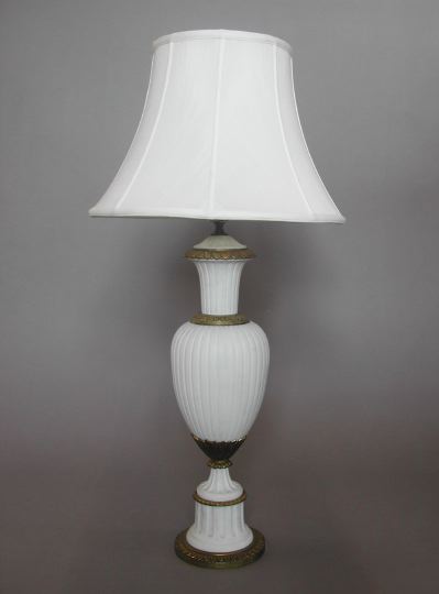 Appraisal: Stately Gilt-Brass-Mounted White Biscuit Porcelain Vasiform Table Lamp second quarter