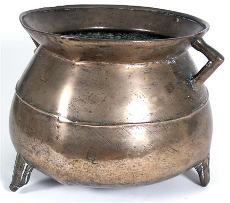 Appraisal: A th century bronze and brass cauldron the bulbous sides