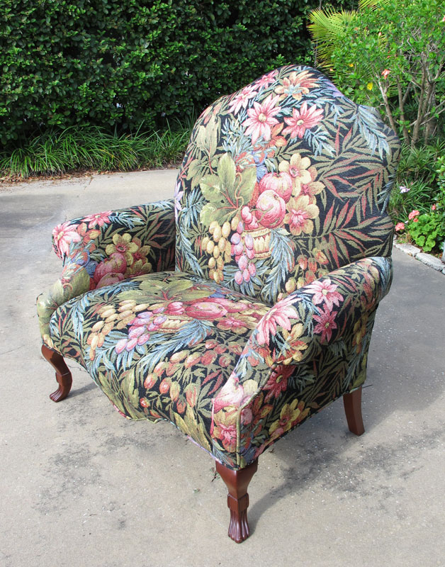 Appraisal: FLORAL WING BACK SETTEE CHAIR Over large wingback chair with