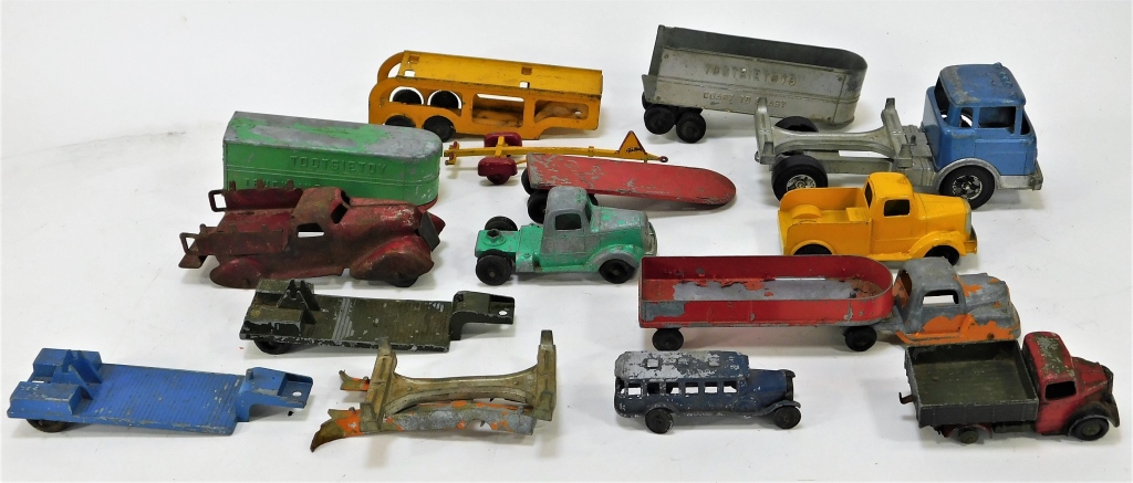 Appraisal: TOOTSIE TOY ASSORTED CAR AND TRAILER GROUPING United States Germany