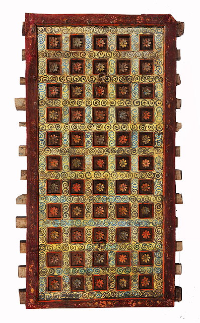 Appraisal: A RAJESTANI INDIAN POLYCHROME PAINTED HARDWOOD CEILING PANEL floral rosettes