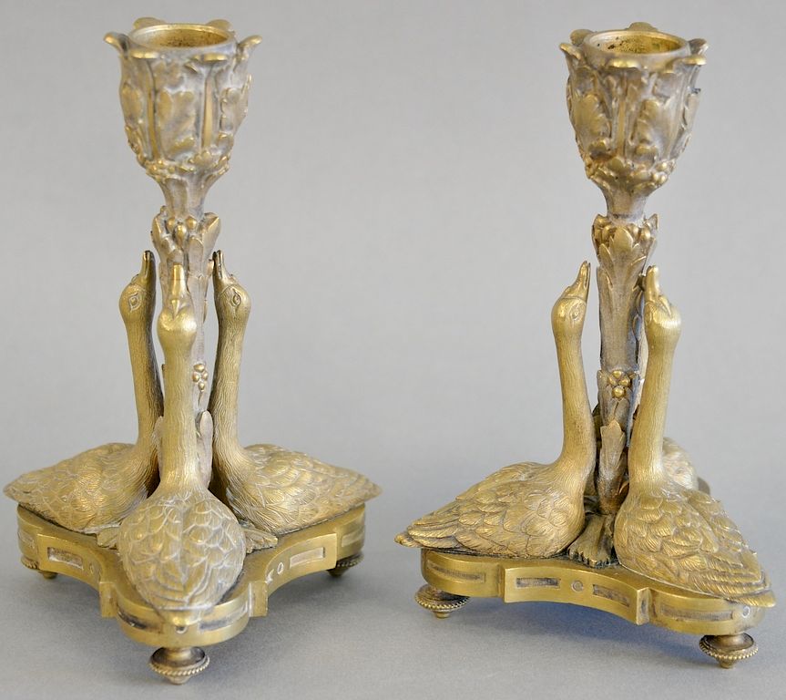 Appraisal: Pair of continental neoclassical figural candlesticks having supports in the