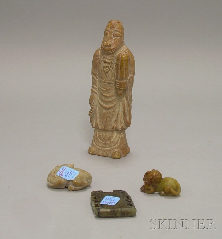 Appraisal: Four Archaic-style Jades a carved standing figure a horse pendant