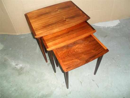 Appraisal: A NEST OF THREE DANISH ROSEWOOD TABLES