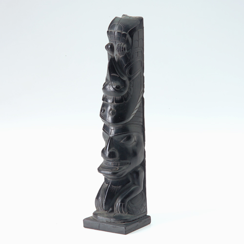 Appraisal: Haida carved argillite totem of a fish and man with