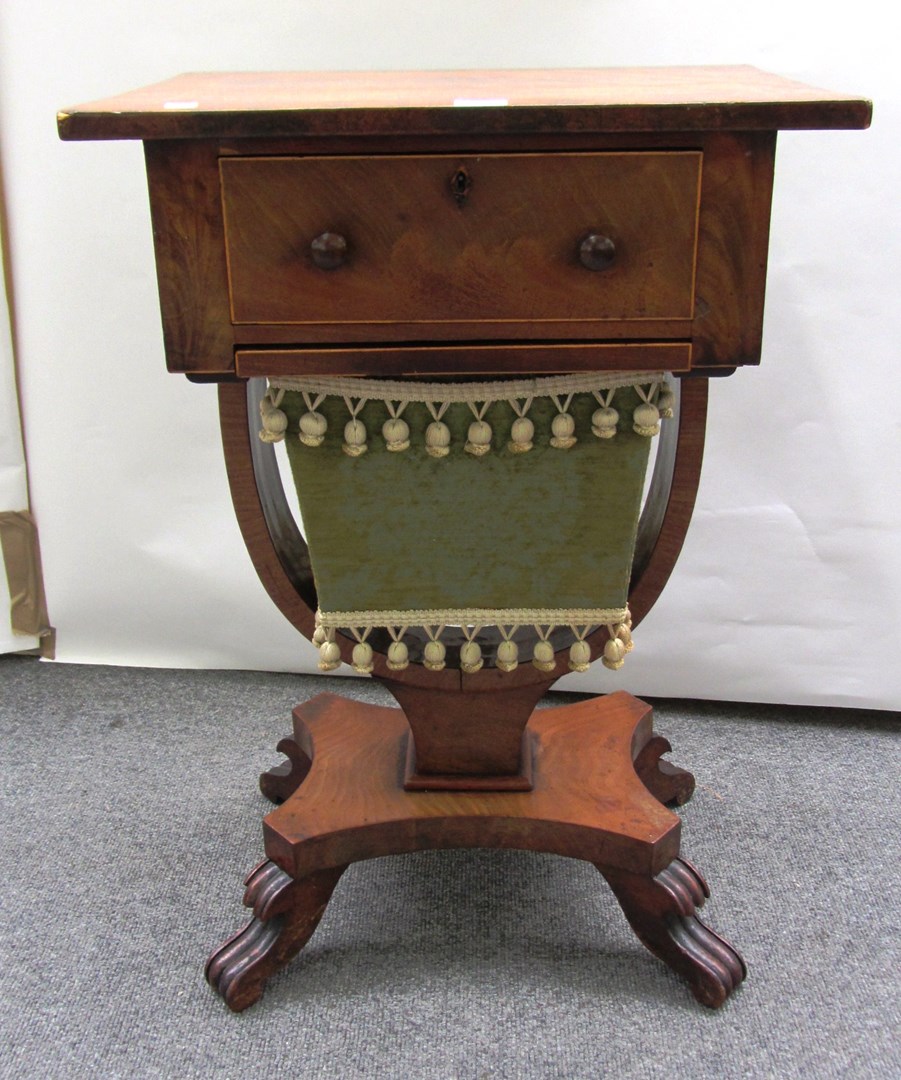 Appraisal: A William IV mahogany sewing table with single door over