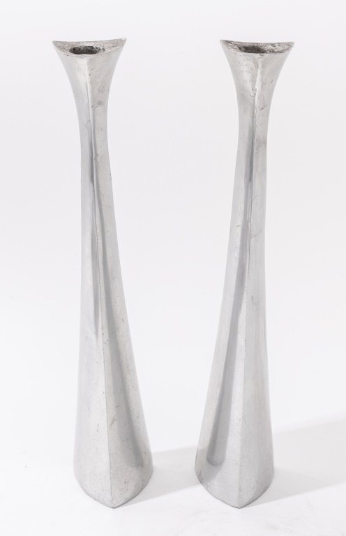 Appraisal: NAMBE TALL TRI-CORNER ALLOY CANDLESTICKS S Nambe tall tri-corner alloy