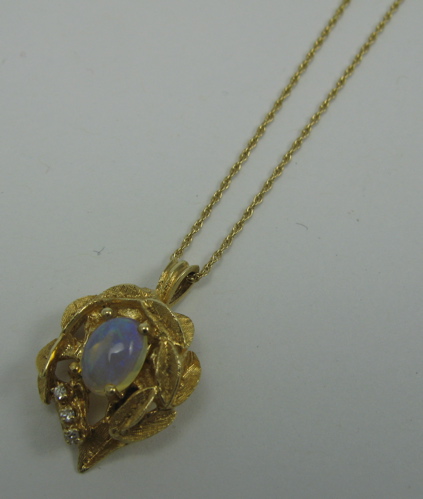 Appraisal: OPAL DIAMOND AND K GOLD PENDANT NECKLACE the pendant suspended