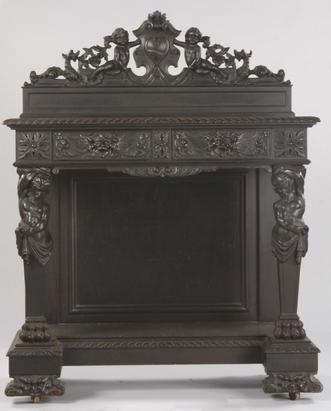 Appraisal: Ebonized figural carved crest over a single drawer supported by