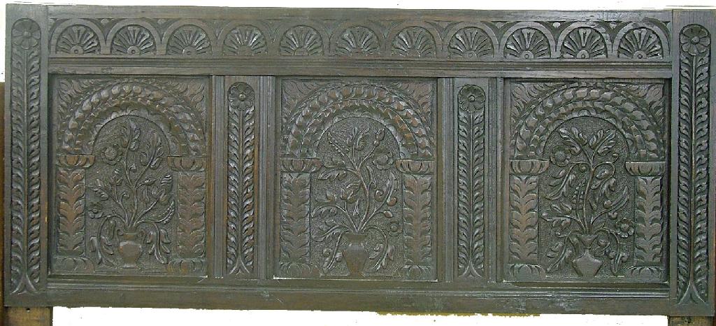 Appraisal: th century carved oak panel decorated with flowerheads and foliage