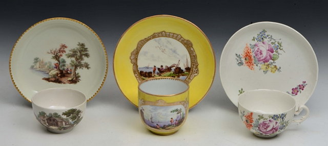 Appraisal: A MEISSEN YELLOW GROUND CUP AND MATCHING SAUCER painted figures