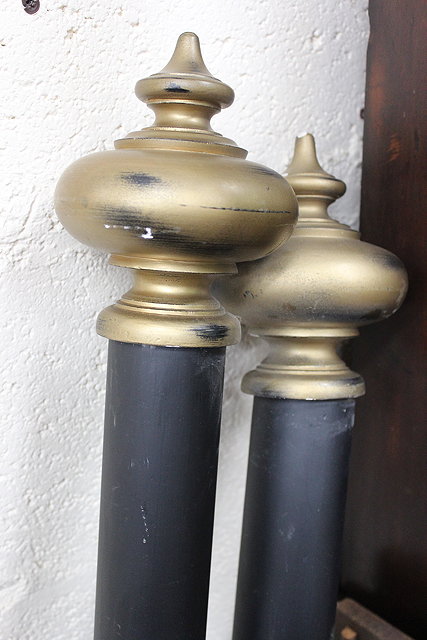 Appraisal: A LIGHT OAK CURTAIN POLE with curtain rings cm in