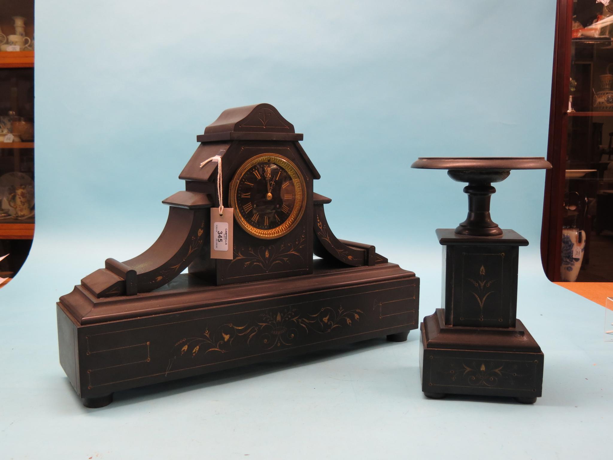 Appraisal: A large Victorian black slate mantel clock garniture with French