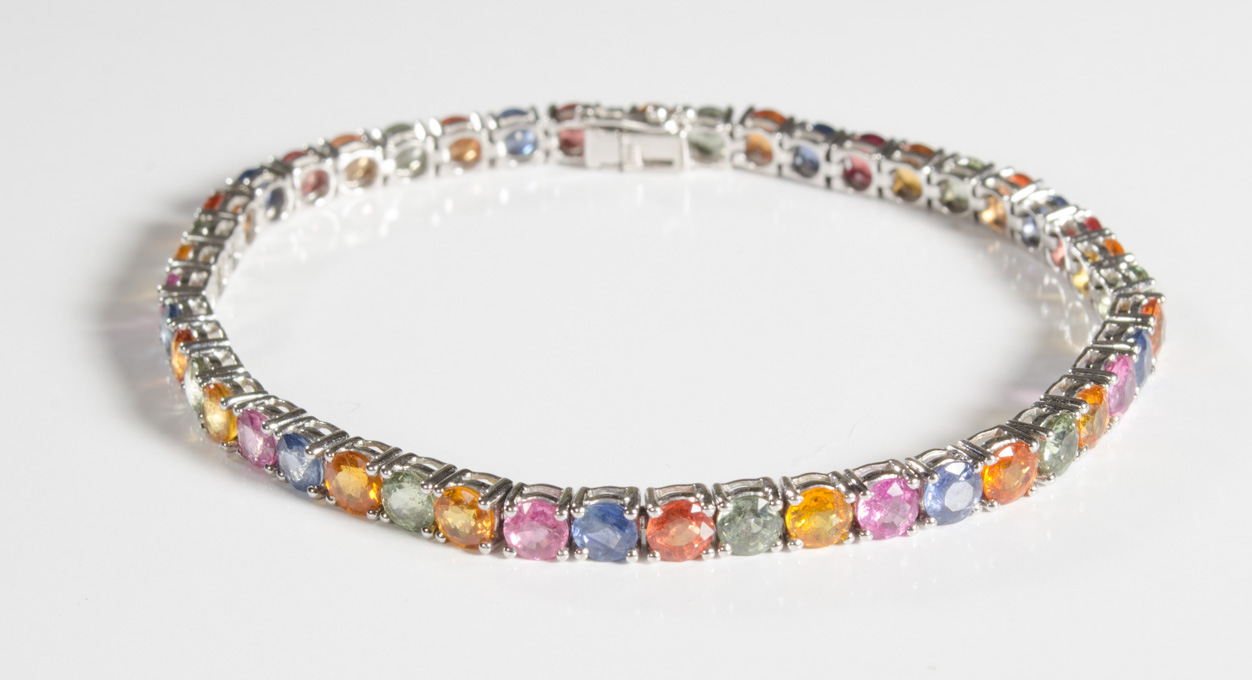 Appraisal: MULTI-COLOR SAPPHIRE AND FOURTEEN KARAT GOLD BRACELET The white gold