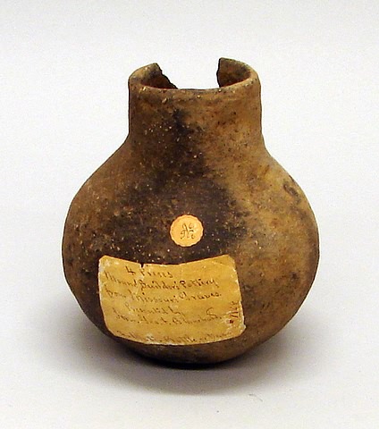 Appraisal: Mound ware water bottle measuring high with early label Pieces