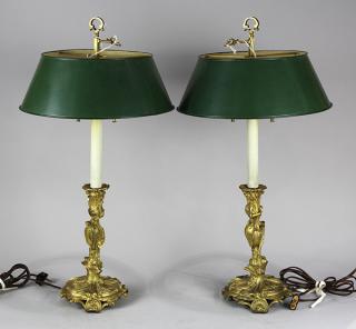 Appraisal: Louis XV style ormolu candlesticks Louis XV style ormolu candlesticks