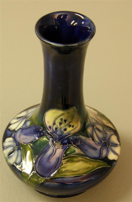 Appraisal: Moorcroft vase decorated with Irises and other flowers on a