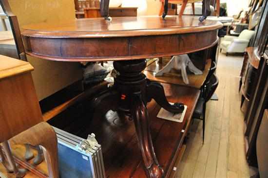 Appraisal: A VICTORIAN CEDAR TILT TOP TABLE