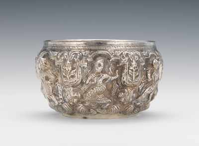 Appraisal: A Silver Repousse Bowl Burmese With deeply chased figures and