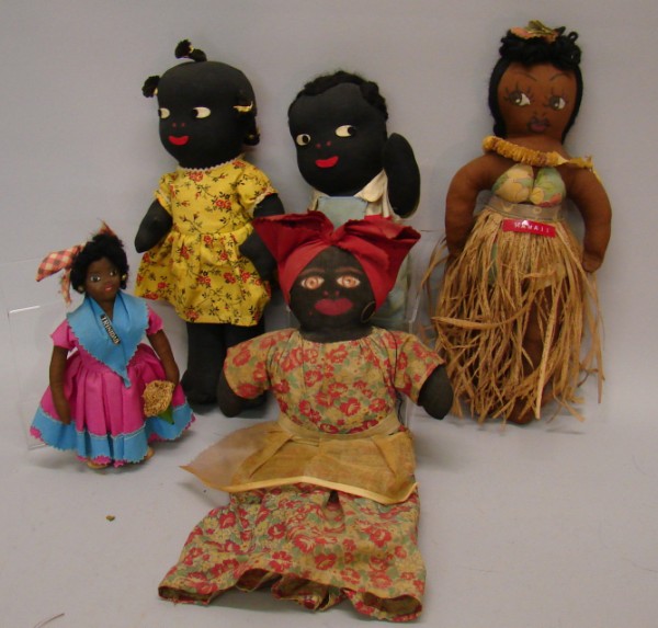 Appraisal: Lot of black cloth dolls Pair of 's boy and