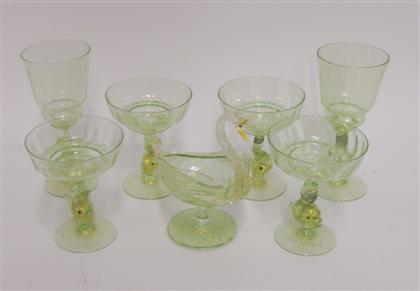 Appraisal: Group of Venetian gold flecked green glass itemsComprising two champagne