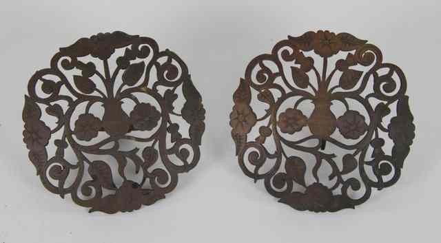 Appraisal: Two pierced sconces engraved a vase of flowers foliage etc