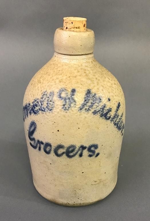 Appraisal: Small Stoneware Jug Small stoneware jug with blue script Comell