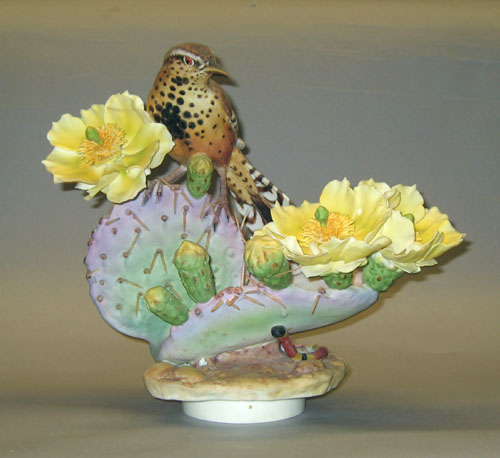 Appraisal: Two Dorothy Doughty Royal Worcester cactus wren and prickley pear