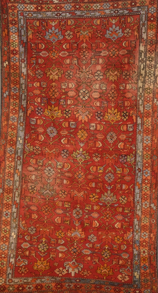 Appraisal: Northwest Persian Rug Circa Red ground with rosette and floral