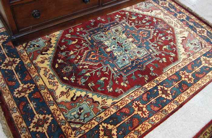 Appraisal: HAND KNOTTED ORIENTAL AREA RUG Persian Serapi design ' ''