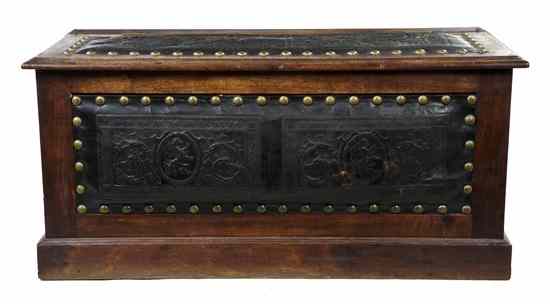 Appraisal: A Spanish Tooled Leather and Walnut Trunk having a rectangular