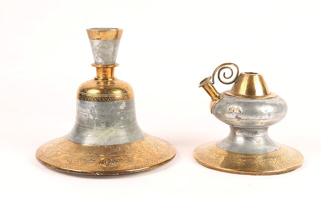 Appraisal: AN INDIAN BRASS AND SILVER COLOURED METAL HOOKAH BASE of