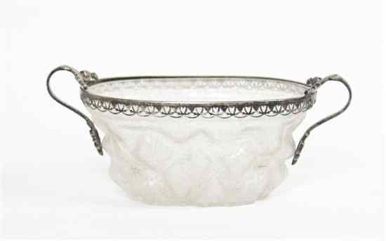 Appraisal: A Silvered Metal Mounted Molded Glass Ice Bowl of oval