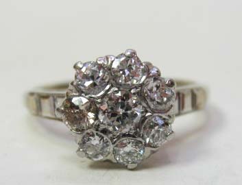 Appraisal: A Gold and Diamond Cluster Ring K marked white gold