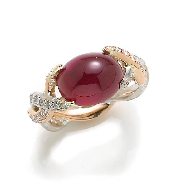 Appraisal: A Burmese ruby and diamond ring centering an oval cabochon