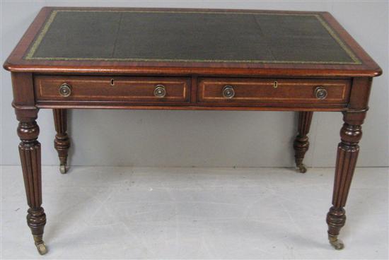 Appraisal: th century mahogany writing table with tooled green leather inset