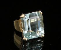 Appraisal: A Ladies' Aquamarine And Gold Ring An emerald cut aquamarine